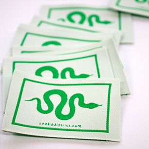 Premium logo labels by Nominette